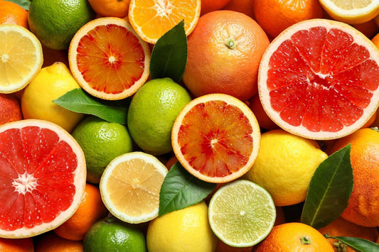 Citrus Bliss scented coconut soy candle – zesty orange, lemon, and grapefruit aroma in bright reusable jar